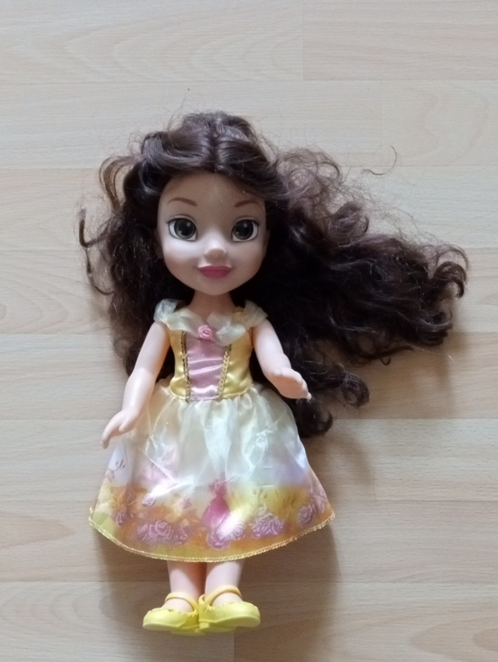 Disney Brown-Haired Doll in Yellow and Pink Floral Dress